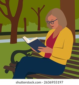 A woman with glasses sits on a bench in a park and reads a book against the background of trees