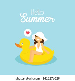 Woman go to travel in summer holiday,Girl wearing white swimsuit swimming on the inflatable yellow duck