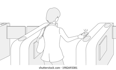 Woman going through the ticket gates.