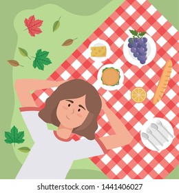 woman with grapes and snack food in the tablecloth