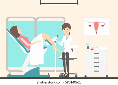 Woman With Gynecologist In Cabinet. Female Doctor Examines Young Woman In Chair.