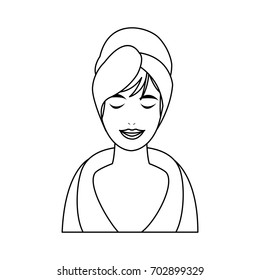 woman with hair wrapped in towel with pleasure showing on her fa