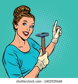 a woman with a hammer. Pop art retro vector illustration vintage kitsch