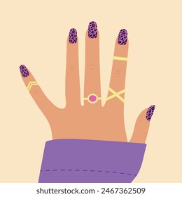 Woman hand with bright leopard print nail design. Colorful nail art manicure design