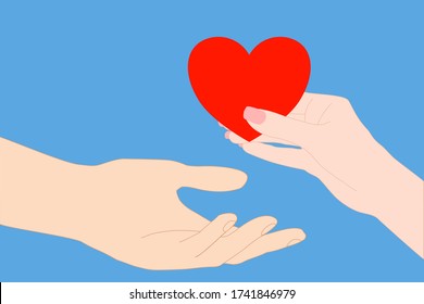 Woman hand is giving a red heart to man hand on the blue background. Encourage other person.  Giving brave. charity or donate to children or poor person. hospital, medical concept. 