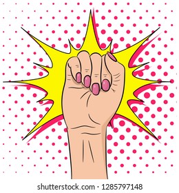Woman hand with her fist raised up. Symbol of feminist movement Pop art. Comic cartoon style. Vector hand drawn illustration.