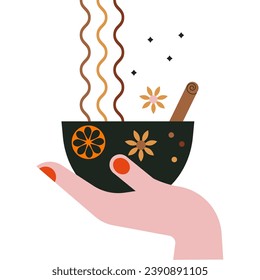 Woman hand holding cup of tea or coffee with orange fruit, star anise and cinnamon stick. Coffee break. Fruit, spices in mug. Spicy and healthy warm winter drink. Cosy tea time. Drink lover concept.