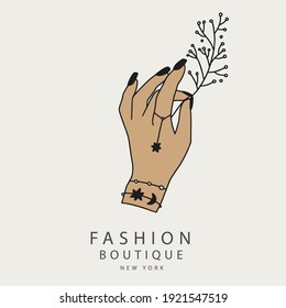 Woman hand holding a flower. Magic feminine astrology logo illustration. Esoteric celestial boho graphic vector logotype.