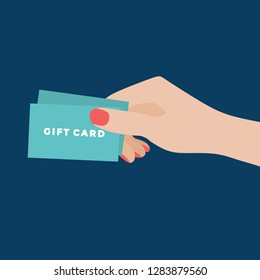 Woman Hand Holding Gift Card. Gift Card In Hand Isolated. Vector Illustration, Flat Design Style. Spending Money. Paying With Gift Card