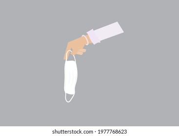 woman hand holding a medical mask for thrown away on dark background