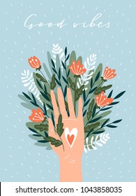 Woman hand isolated on the blue background with flowers, heart and lettering - 'Good vibes'. Cute inspirational card. Vector illustration in hand drawn style.