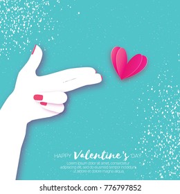 Woman hand making shape of pointed gun.Origami Female holding Two fingers like a revolver. Love Bang. Pink Heart Shot in paper cut style. Valentine day. Romantic Holidays.