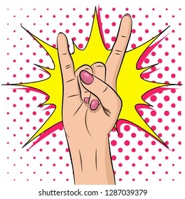 Woman hand with rock n roll sign. Pop art background. Comic cartoon style. Hand drawn vector illustration.