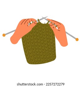 Woman hands are knitting with knitting needles. Knitting process. Wool yarns, hook, knitting needles. Hobby time, handmade things