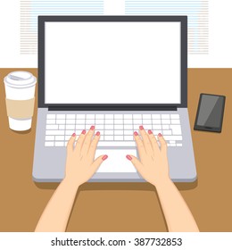 Woman hands writing working on laptop with coffee cup and smartphone on table