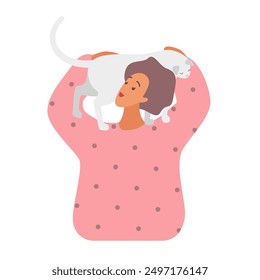 A woman happily carries a white cat on her shoulders while wearing a pink polka dot sweater.