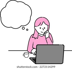 A woman happily operating a computer