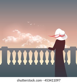 Woman in hat on sky background