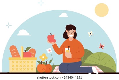 Woman having a picnic in the park