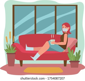 A woman is having a relax time in living room with some cup of hot drink