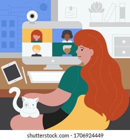 A woman having a video conference with her coworkers at home during Covid-19 quarantine