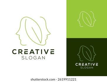Woman head with leaf elements logo design for wellness, spa and beauty