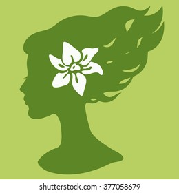 Woman head in profile vector silhouette with flower
