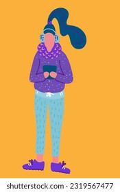 woman in headphones looking at the phone