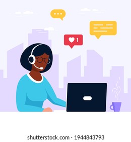 Woman with headphones and microphone with laptop