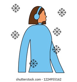 woman with headphones and winter snowflakes