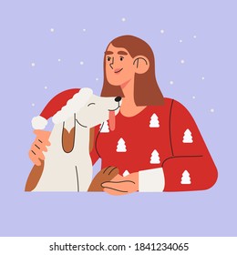 Woman with her happy dog and best friend celebrating winter holidays, christmas and New year in santa hat and red sweater with fir trees. Xmas miracle and new home for homeless dog or pet concept.