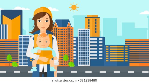 Woman holding baby in sling.