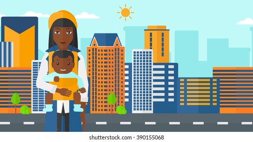 Woman holding baby in sling.