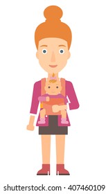 Woman holding baby in sling.