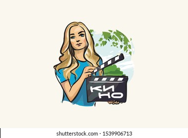 Woman holding black clapperboard. Holding film. People lifestyle concept. Text in Russian "Cinema". Poster, postcard, calendar.