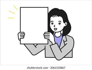 A woman holding up a board to make a presentation
