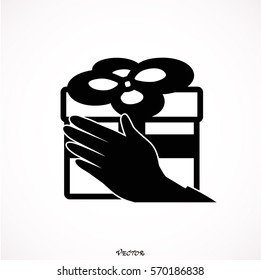 woman holding a box with gifts in hands. Vector flat design illustration isolated on white background.