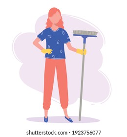 Woman is holding a broom, she is going to do the cleaning.