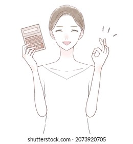 Woman holding calculator and holding OK sign. On white background.