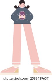 A woman is holding a cell phone in her hand. She is wearing a pink shirt and pink pants