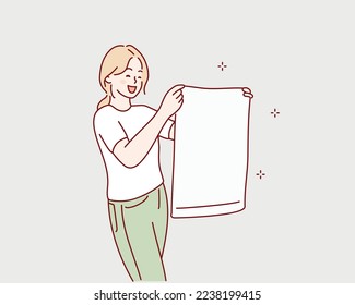 woman holding a clean towel. Hand drawn style vector design illustrations.