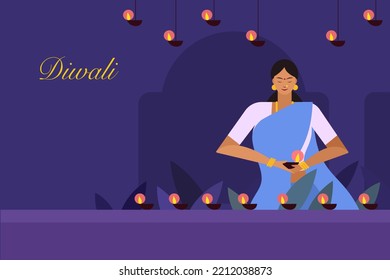 A woman holding Diwali festival lamps. Concept for Diwali festival in India