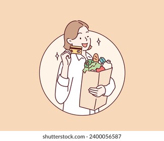 woman holding groceries and credit card smiling with a happy and cool smile on face. Hand drawn style vector design illustrations.