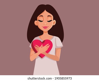 Woman Holding a Heart Symbol Feeling Thankful. Happy girl being grateful and having compassion
