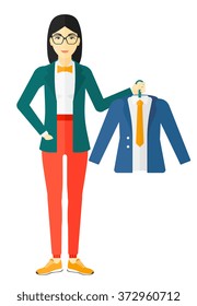 Woman holding jacket.
