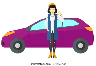 Woman holding key from new car.
