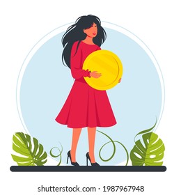 woman holding a large coin of money in her hands..Happy successful character with a coin. Financial well-being. Business investment and money savings. Fees and funding