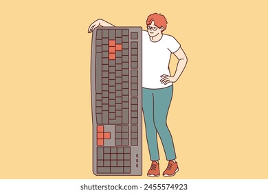 Woman is holding large computer keyboard, encouraging you to become freelancer and work remotely. Girl leans on keyboard to type articles for online magazines or email messages for colleagues.