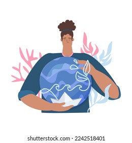 Woman holding a miniature of a world and a ship in her hands, concept for carbon offset