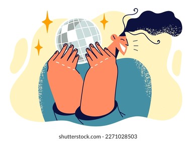 Woman holding mirror disco ball for party and smiling enjoying club music and nightlife. Girl has fun and relaxes at parties or dances during cool disco with modern energetic music